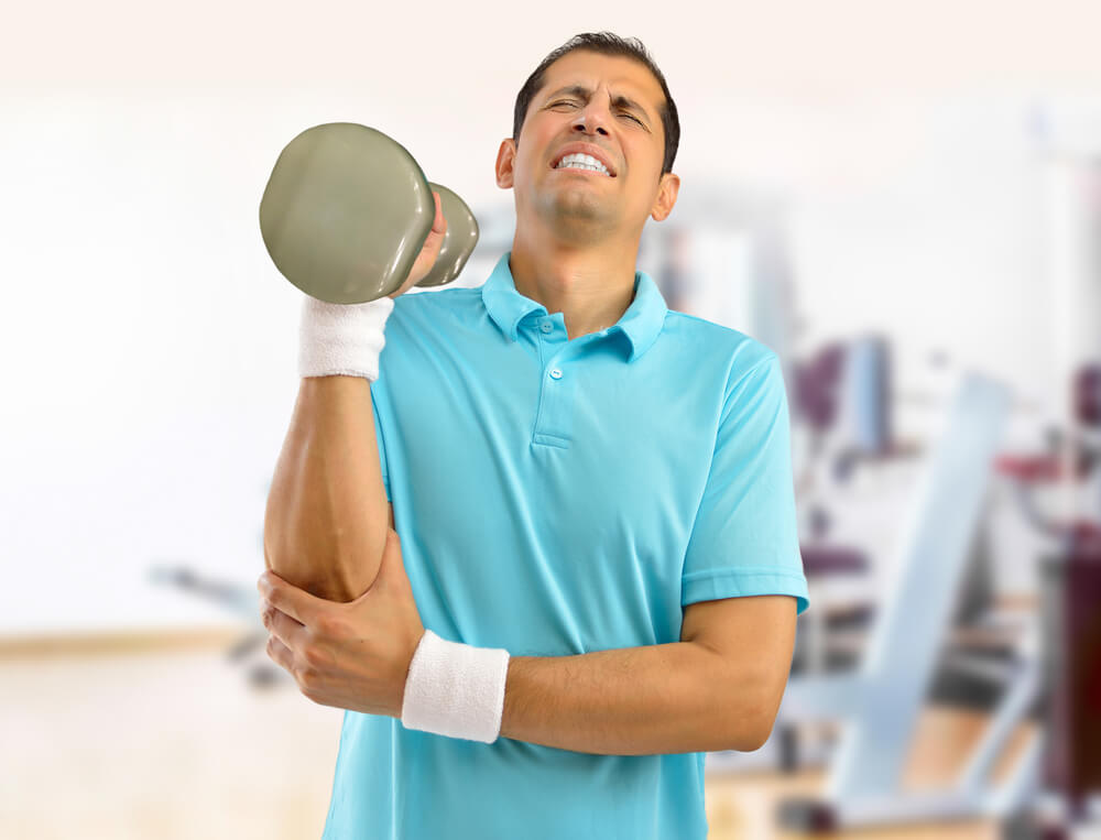 Why do I have elbow pain when lifting heavy objects?