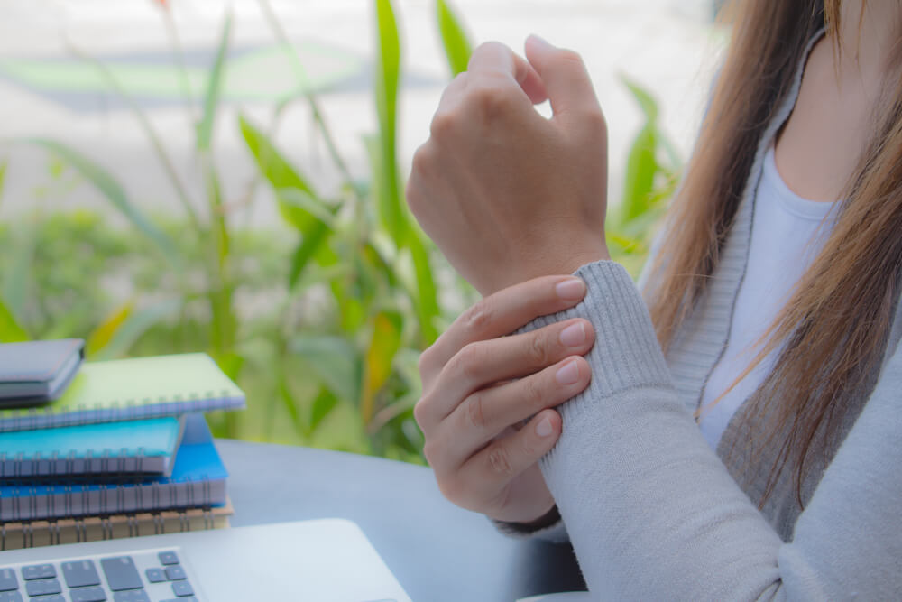 Why do I have pain on the outside of my wrist?