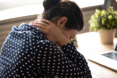 Why am I feeling neck pain at the base of my skull?