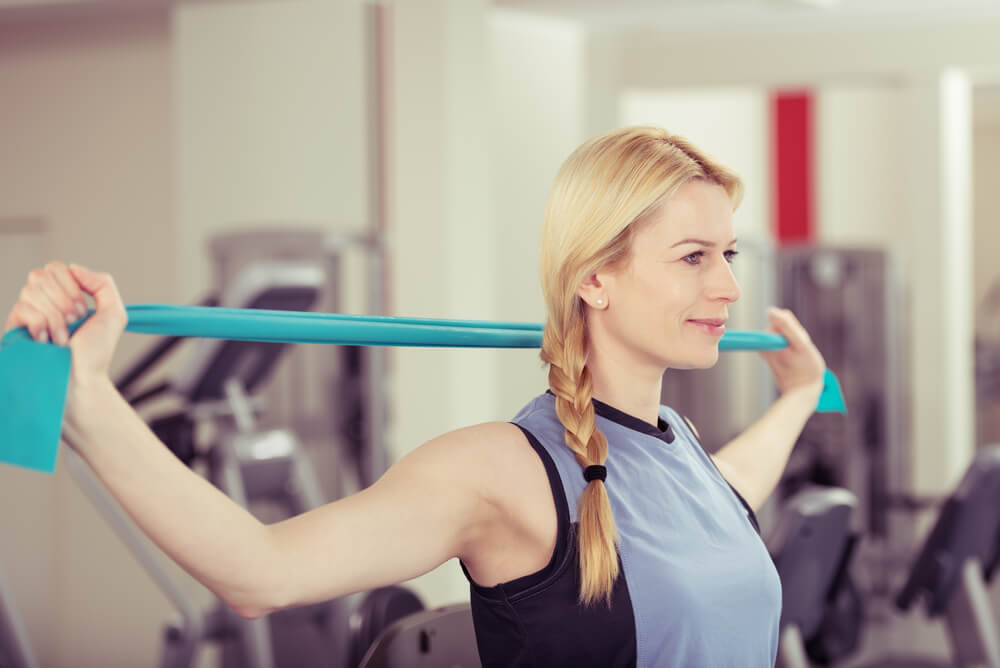 How can physical therapists help with workplace injury prevention?
