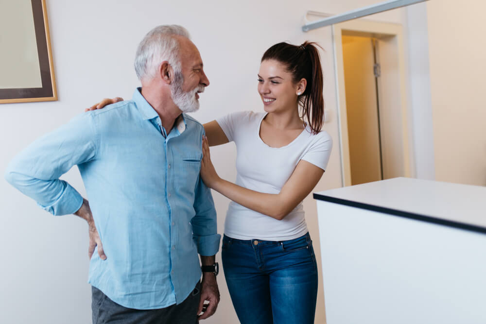 How can physical therapists help treat my lower back and knee pain?