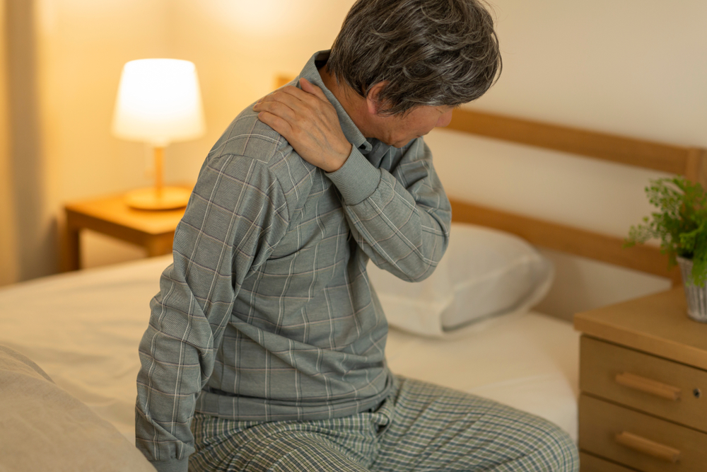 How should I sleep so that I’m more comfortable with shoulder arthritis?
