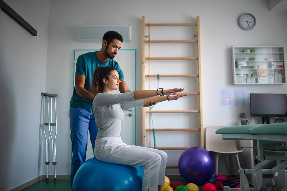 Top 7 interview questions every physical therapy aide should be prepared for young male physiotherapist exercising with young w 2023 11 27 04 53 15 utc top 7 interview questions every physical therapy aide should be prepared for physical therapy