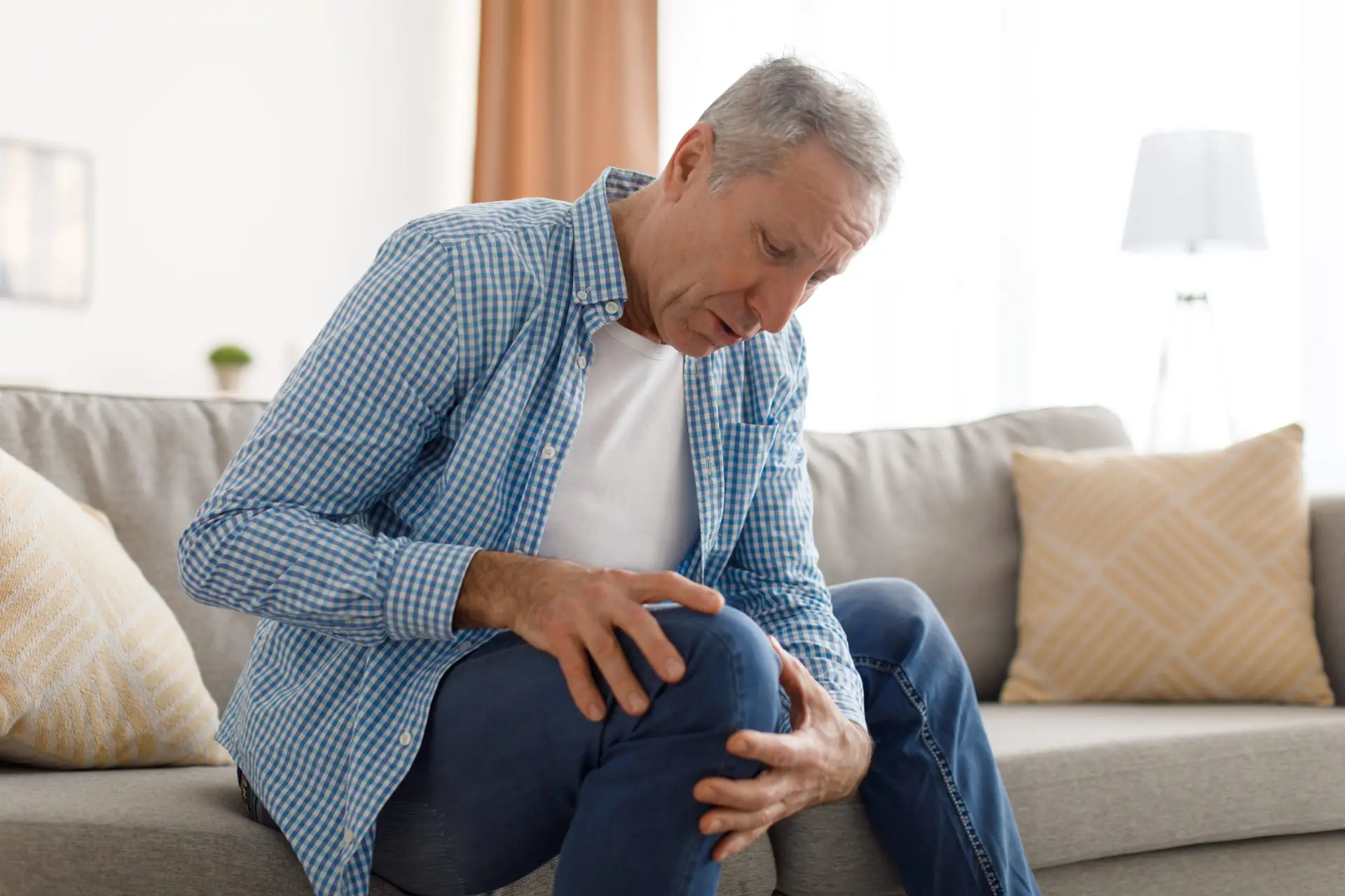 Why am I feeling hip and back pain after a total knee replacement?